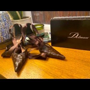 Delman woven leather pumps